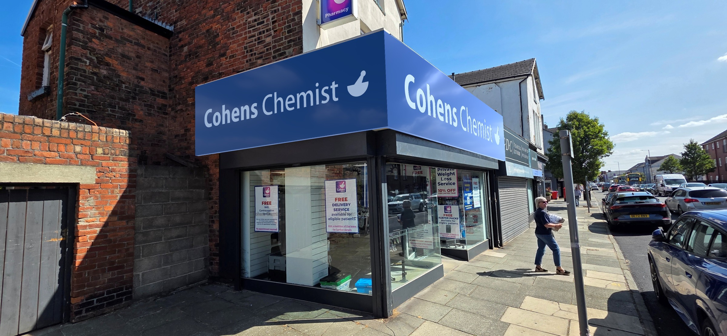 Saved Cohens daytime corner-view mock up showing both fascia legs